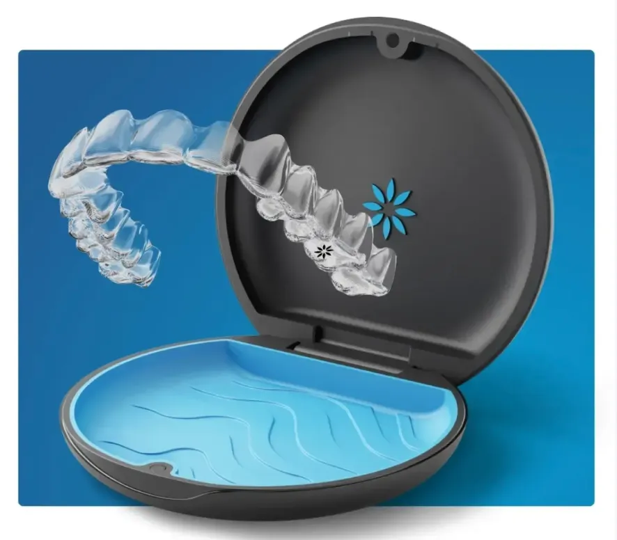Clear aligners displayed above an open aligner case